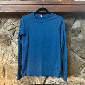 Size 8 Lululemon medium-weight long sleeve.